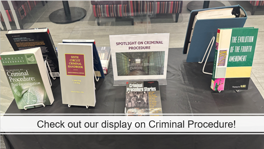 Criminal Procedure display with texts on criminal procedure and constitutional rights of the accused