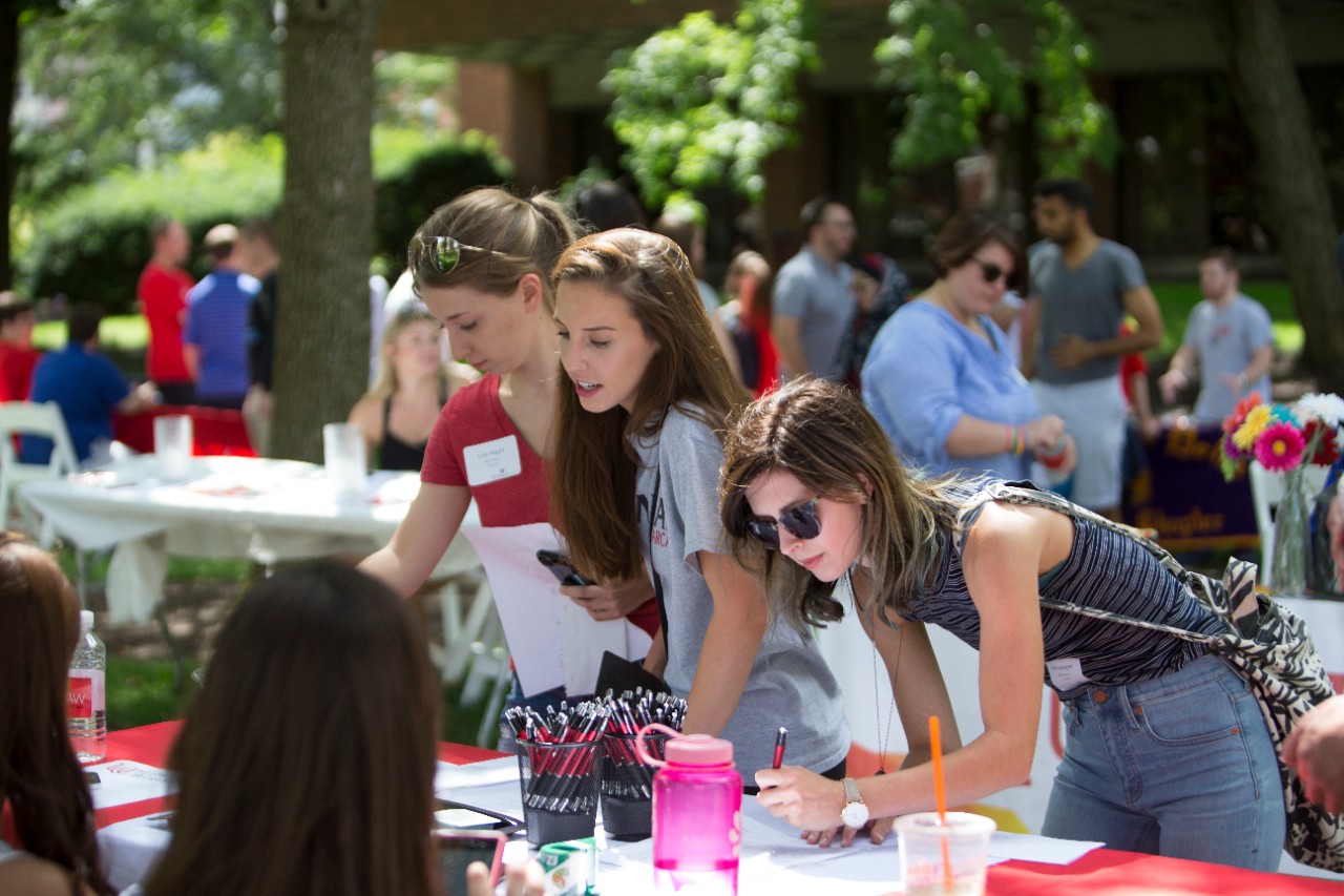 College of Law students interact with students during at the College of Law SBA Grill Out & Organization Fair. UC/Joseph Fuqua II